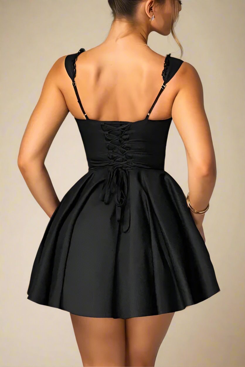 Woman wearing a figure flattering  Adelyn Bodycon Mini Dress - Classic Black BODYCON COLLECTION