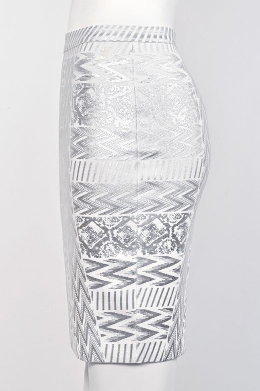 Woman wearing a figure flattering  High Waist Metallic Leather Mini Skirt - Silver BODYCON COLLECTION