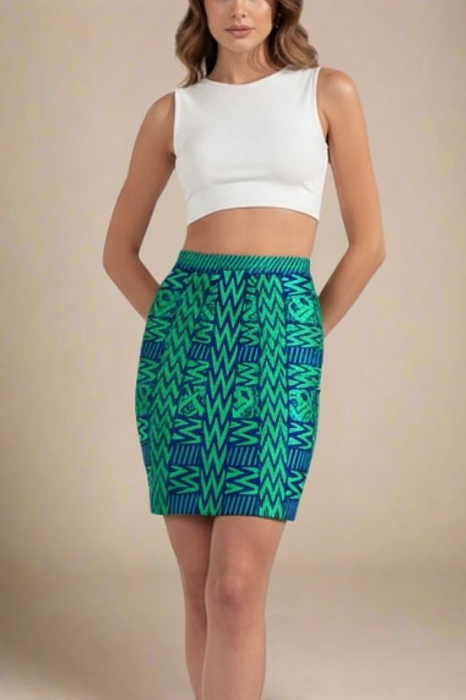 Woman wearing a figure flattering  High Waist Metallic Mini Skirt - Emerald Green BODYCON COLLECTION