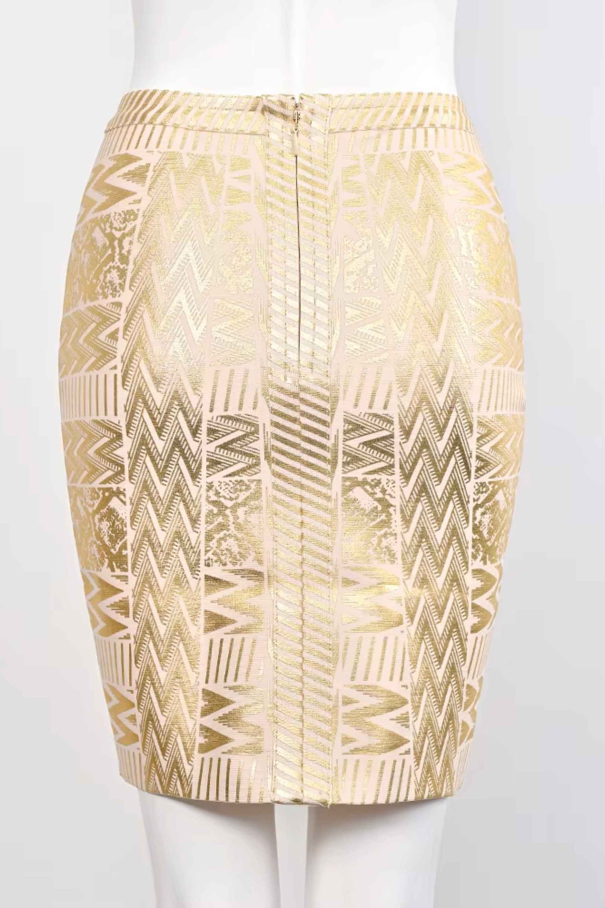 Woman wearing a figure flattering  High Waist Metallic Mini Skirt - Gold BODYCON COLLECTION