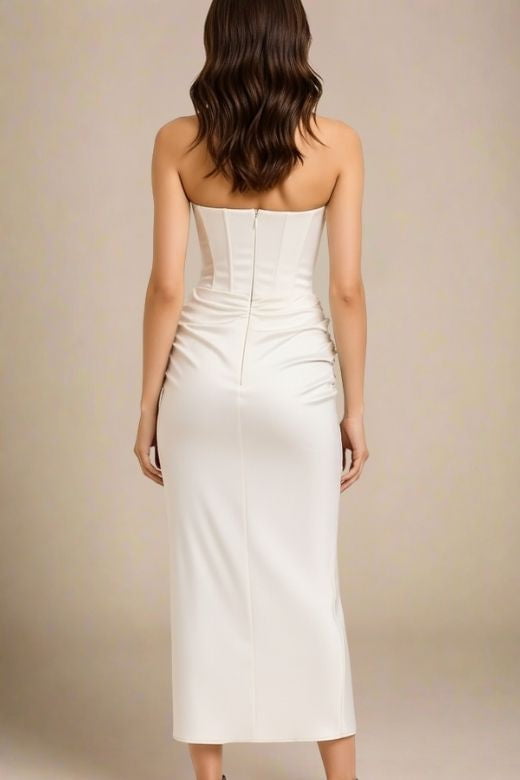 Woman wearing a figure flattering  Hope Bodycon Wrap Maxi Dress - White Pearl BODYCON COLLECTION
