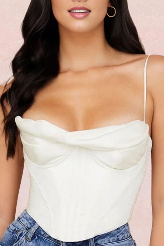 Woman wearing a figure flattering  Indi Corset Crop Top - Pearl White BODYCON COLLECTION