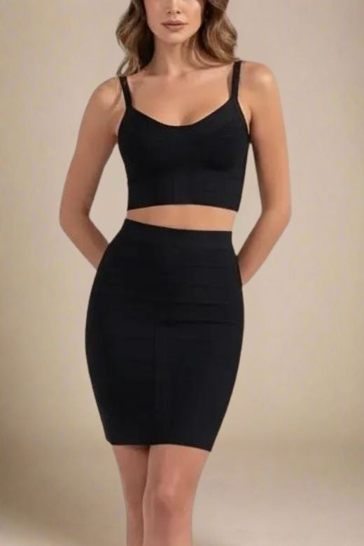 Woman wearing a figure flattering  India Bandage Top and Mini Skirt Outfit Set - Classic Black BODYCON COLLECTION