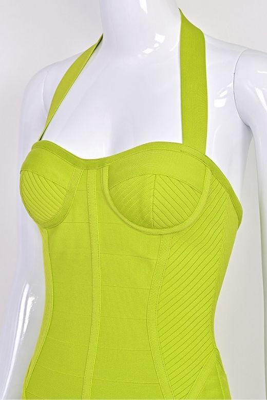 Woman wearing a figure flattering  Isabella Bandage Mini Dress - Neon Green BODYCON COLLECTION Pty Ltd