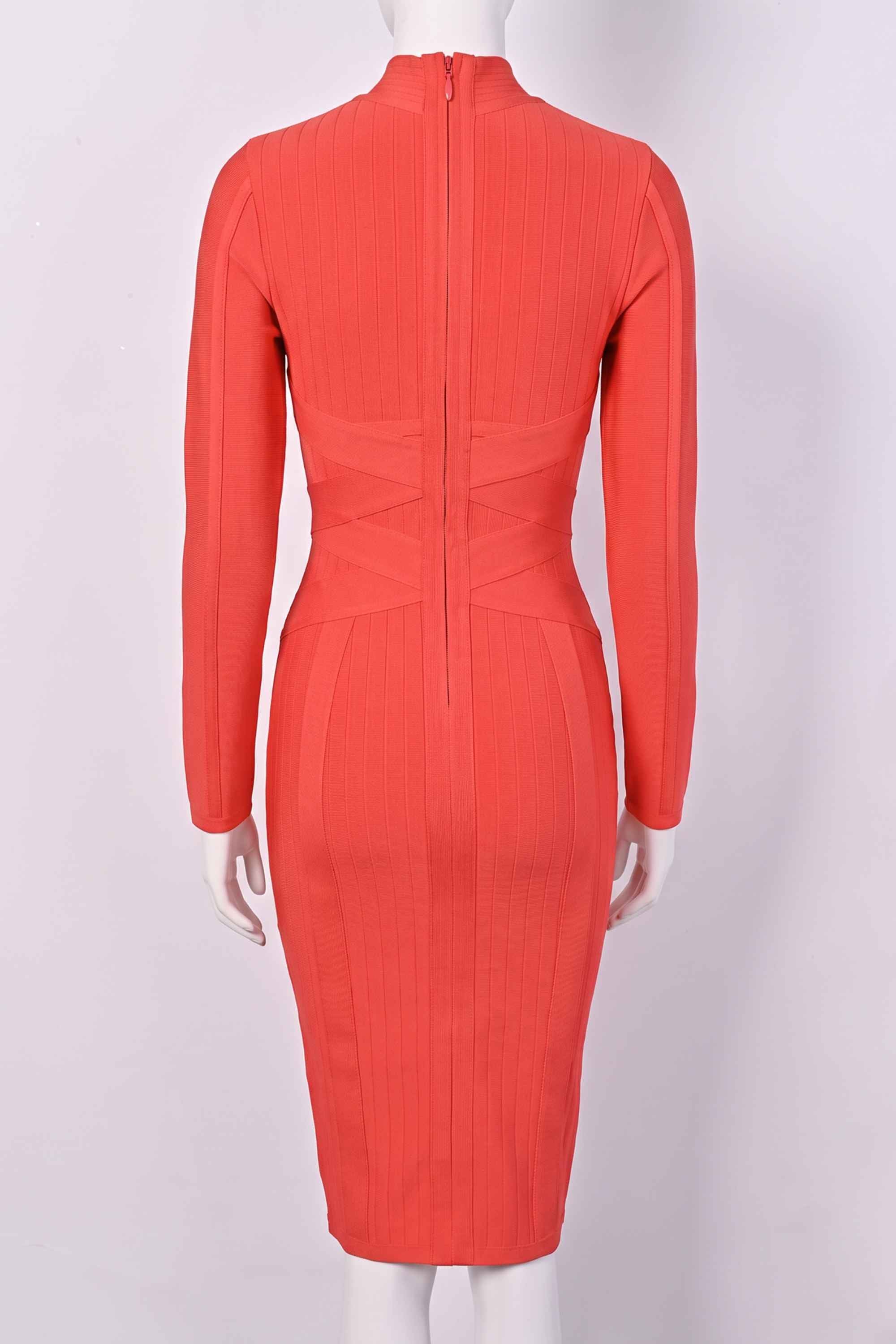 Woman wearing a figure flattering  Jane Long Sleeve Bodycon Midi Dress - Lipstick Red Bodycon Collection