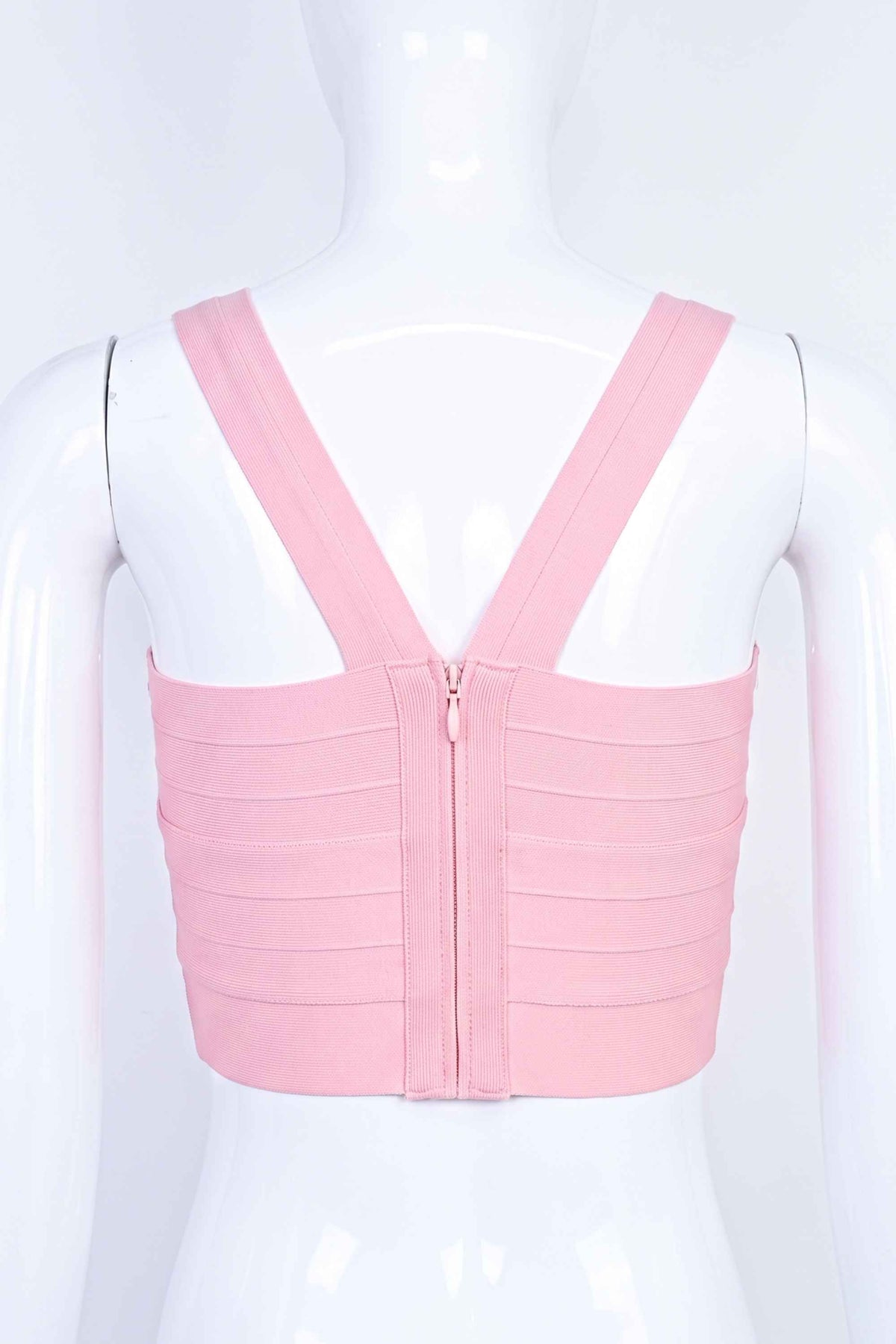 Woman wearing a figure flattering  Jay Bandage Crop Top - Dusty Pink BODYCON COLLECTION