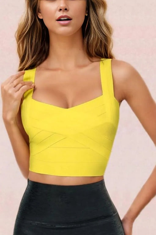 Woman wearing a figure flattering  Jay Bandage Crop Top - Sun Yellow BODYCON COLLECTION