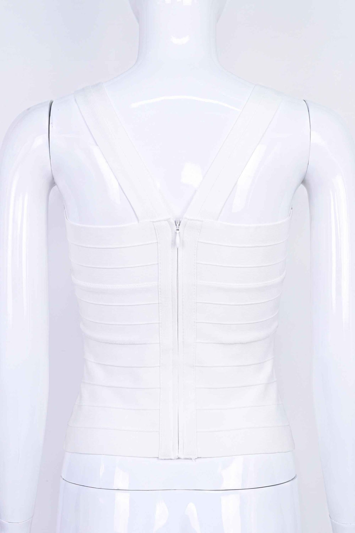 Woman wearing a figure flattering  Jay Bandage Top - White Pearl BODYCON COLLECTION