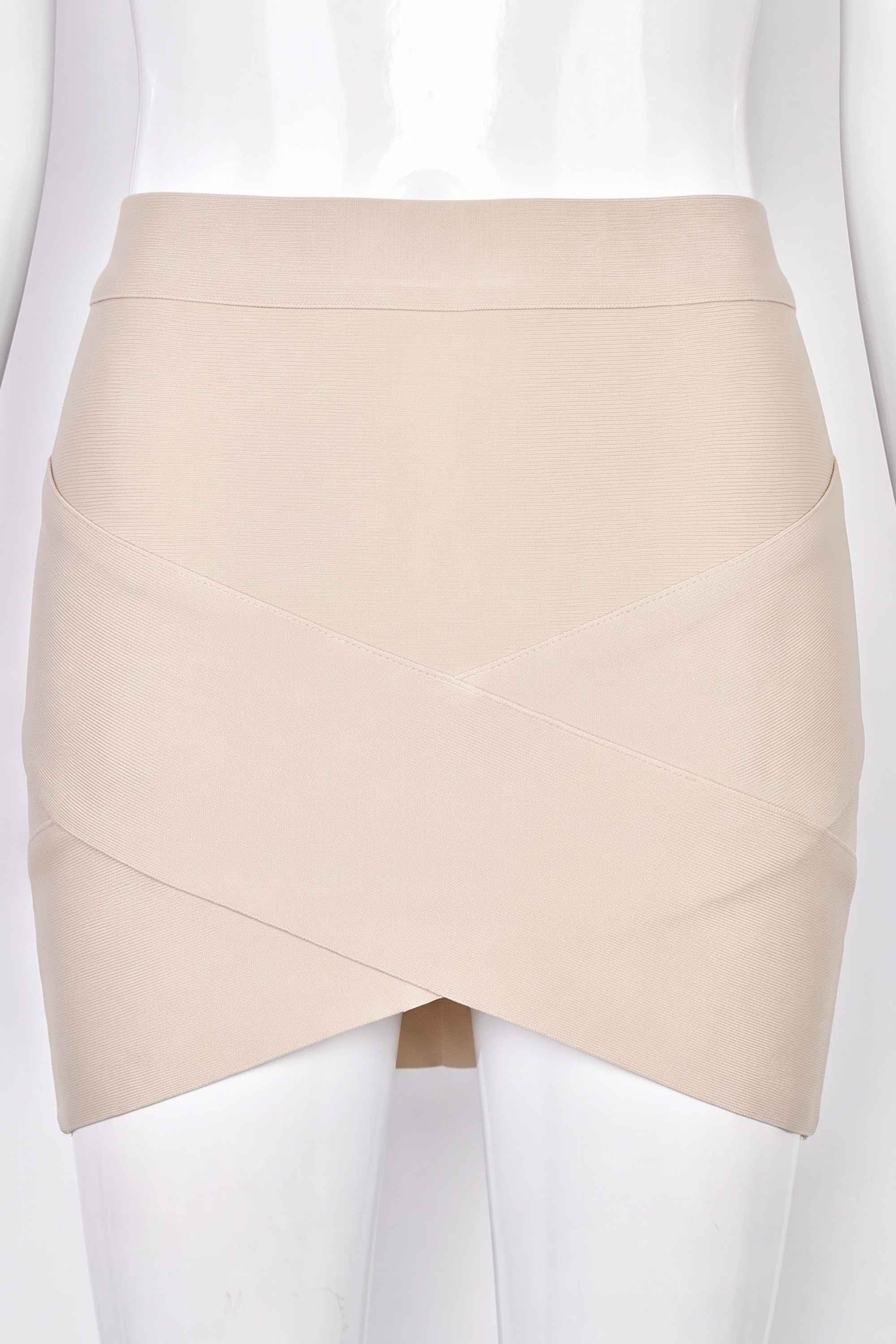 Woman wearing a figure flattering  Jay High Waist Bandage Mini Skirt - Cream BODYCON COLLECTION