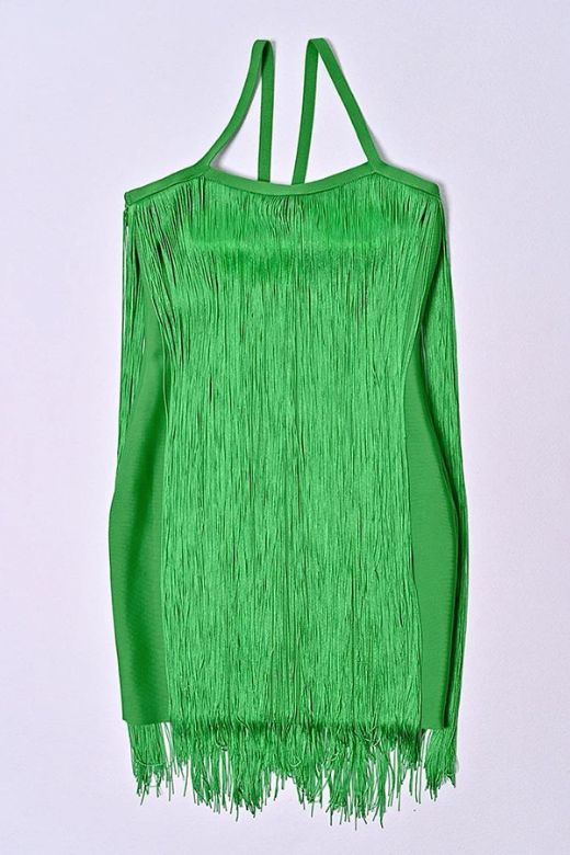 Woman wearing a figure flattering  Jazel Bodycon Mini Dress - Emerald Green BODYCON COLLECTION