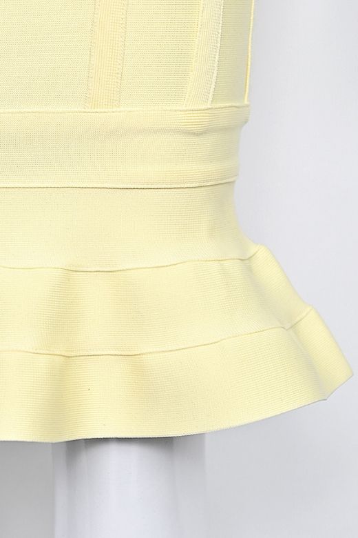 Woman wearing a figure flattering  Joy Bandage Midi Dress - Sun Yellow Bodycon Collection