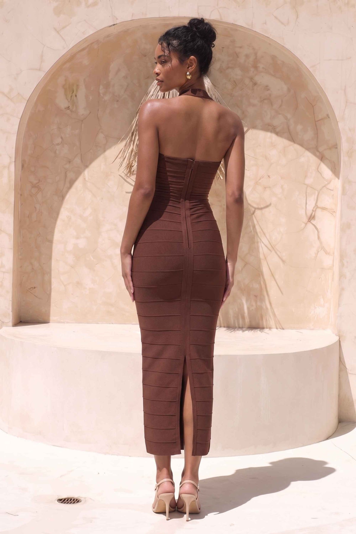 Woman wearing a figure flattering  Kia Bandage Maxi Dress - Chocolate Brown BODYCON COLLECTION Pty Ltd