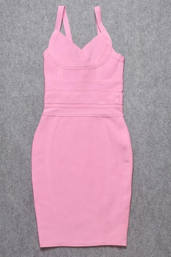 Woman wearing a figure flattering  Kit Bandage Dress - Blush Pink Bodycon Collection