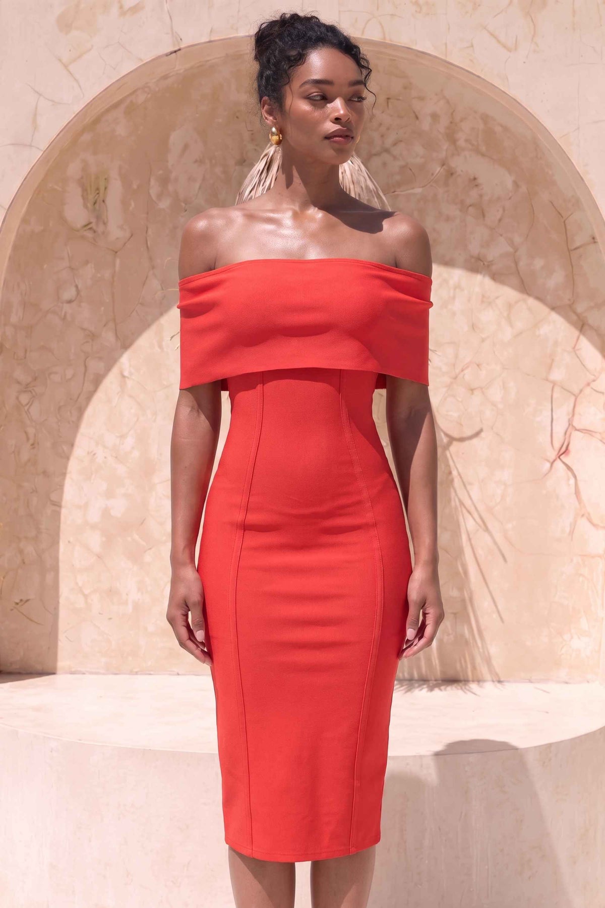 Woman wearing a figure flattering  Kristina Bodycon Dress Dress - Lipstick Red BODYCON COLLECTION