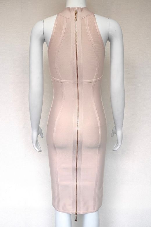 Woman wearing a figure flattering  Lea Bandage Midi Dress - Beige Bodycon Collection