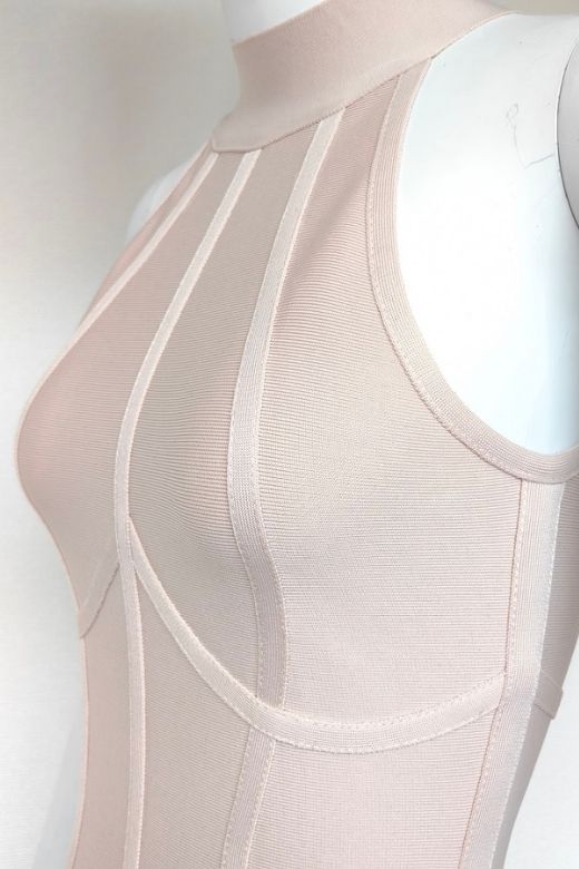 Woman wearing a figure flattering  Lea Bandage Midi Dress - Beige Bodycon Collection