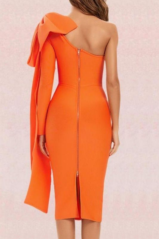 Woman wearing a figure flattering  Lela Long Sleeve Bandage Midi Dress - Apricot Orange BODYCON COLLECTION