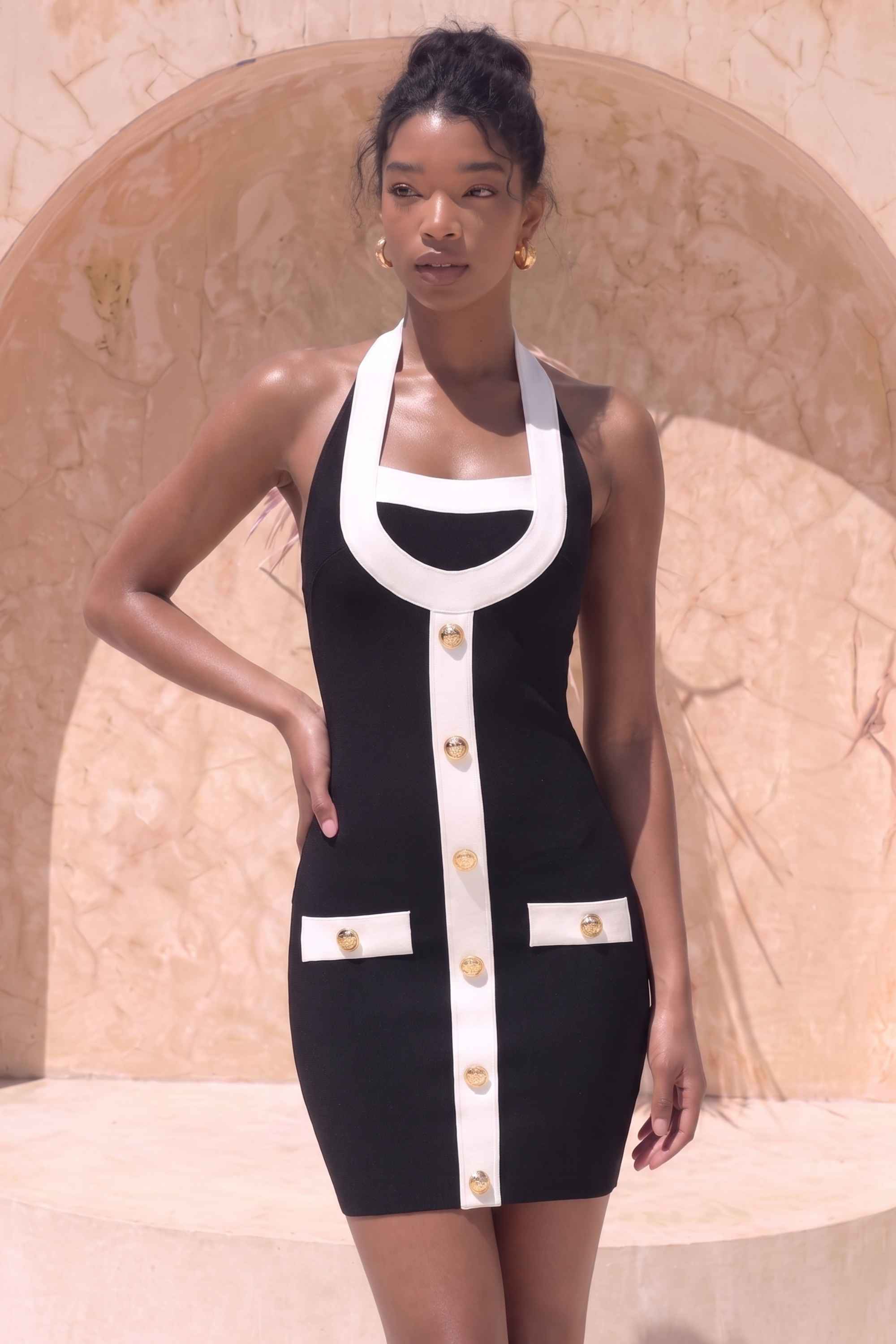 Woman wearing a figure flattering  Leone Bandage Mini Dress - Classic Black BODYCON COLLECTION Pty Ltd