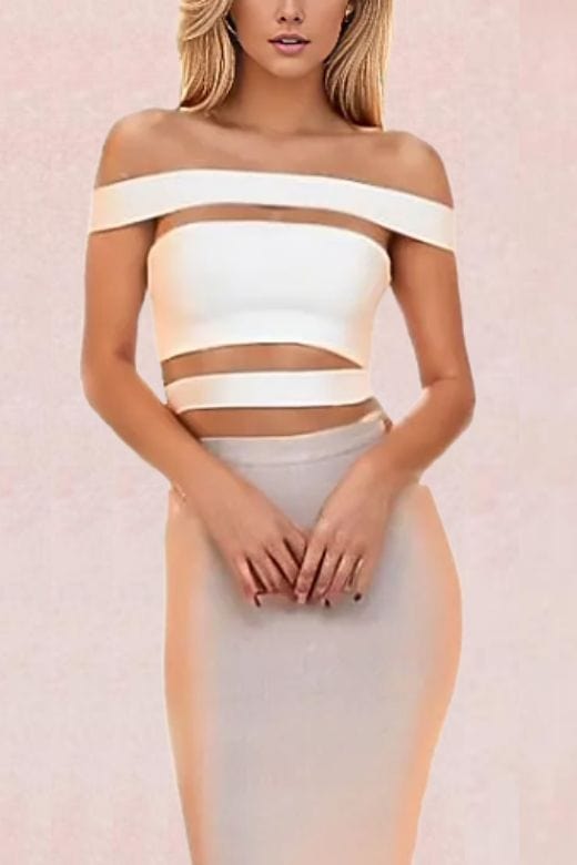 Woman wearing a figure flattering  Lexia Bandage Crop Top - Pearl White BODYCON COLLECTION