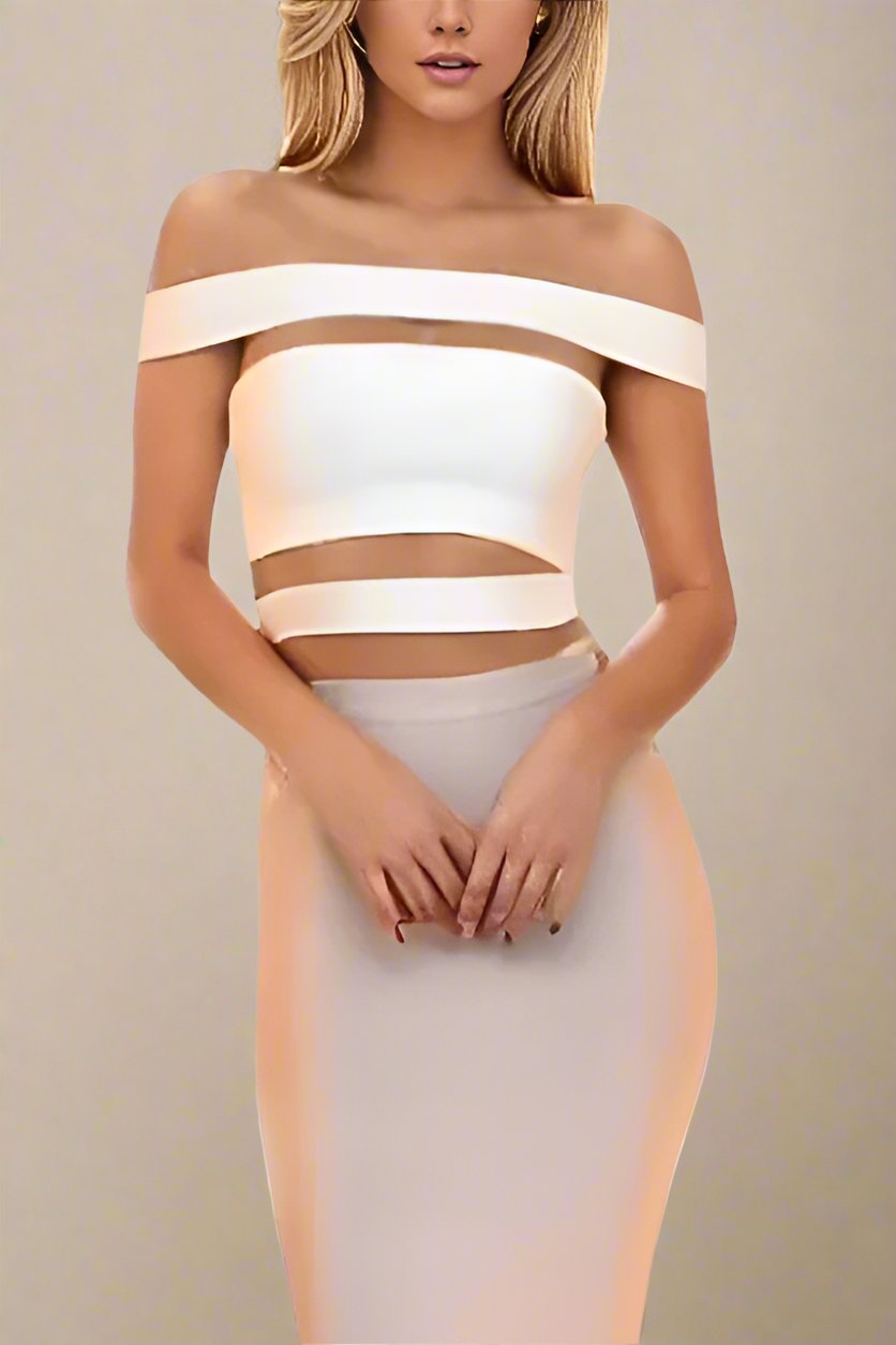 Woman wearing a figure flattering  Lexia Bandage Crop Top - Pearl White BODYCON COLLECTION