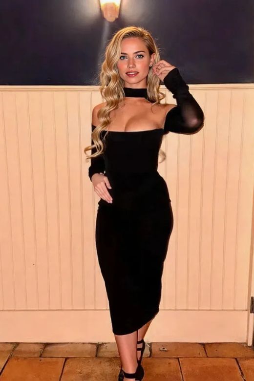 Woman wearing a figure flattering  Lillian Bodycon Midi Dress - Classic Black BODYCON COLLECTION