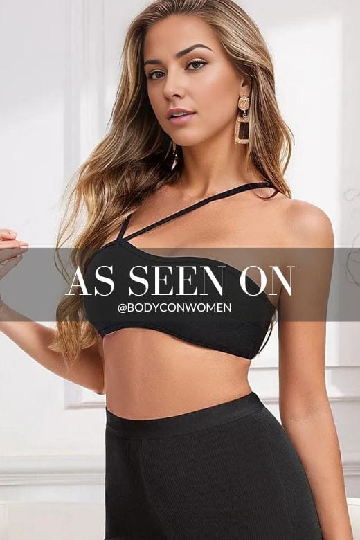 Woman wearing a figure flattering  Lina Bandage Strapless Crop Top - Classic Black BODYCON COLLECTION