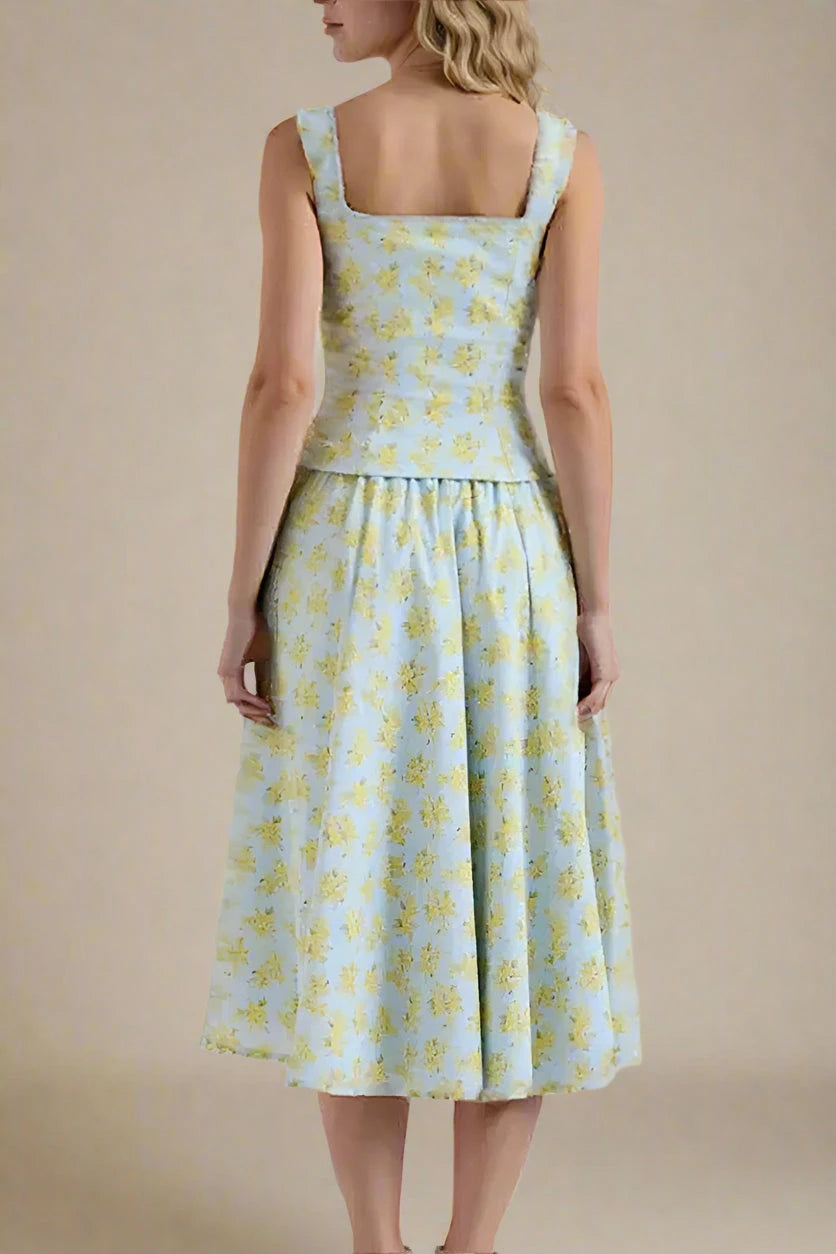 Woman wearing a figure flattering  Livia Top and Midi Skirt Set - Sky Blue BODYCON COLLECTION Pty Ltd