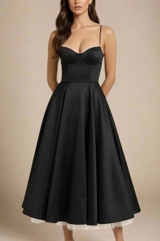 Woman wearing a figure flattering  Mavis Midi Dress - Classic Black BODYCON COLLECTION