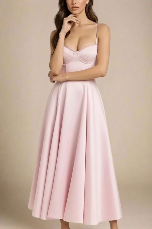 Woman wearing a figure flattering  Mavis Midi Dress - Dusty Pink BODYCON COLLECTION