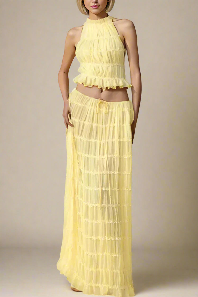 Woman wearing a figure flattering  Meryl Wrap Top and Maxi Skirt Set - Butter Yellow BODYCON COLLECTION