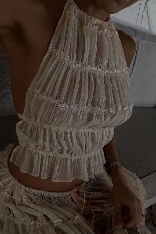 Woman wearing a figure flattering  Meryl Wrap Top and Maxi Skirt Set - Cream BODYCON COLLECTION