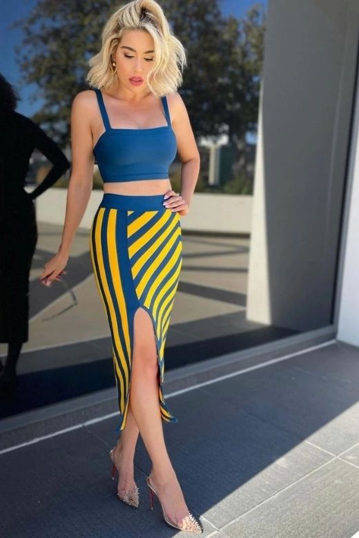 Woman wearing a figure flattering  Nadia Bandage Crop Top and Midi Skirt Outfit Set - Royal Blue BODYCON COLLECTION