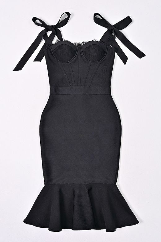 Woman wearing a figure flattering  Nora Bandage Midi Dress - Classic Black BODYCON COLLECTION