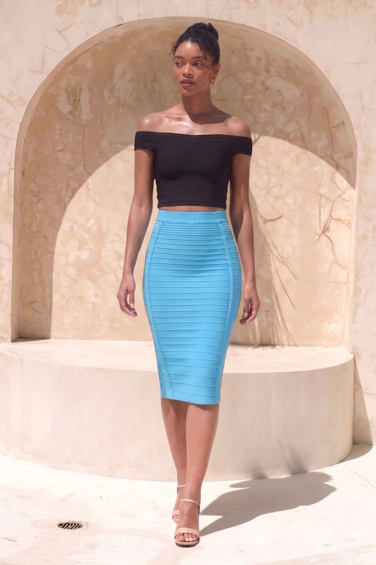 Woman wearing a figure flattering  Pencil High Waist Bandage Knee Length Knitted Skirt - Sky Blue BODYCON COLLECTION