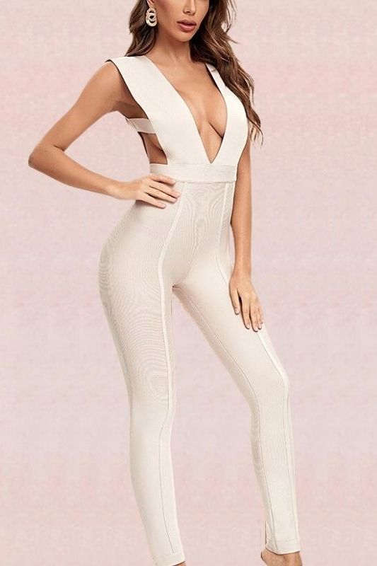 Woman wearing a figure flattering  Pia Bandage Pants Jumpsuit - Cream BODYCON COLLECTION