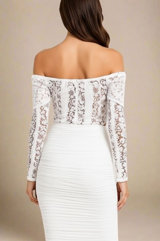 Woman wearing a figure flattering  Rose Long Sleeve Top - White Pearl BODYCON COLLECTION