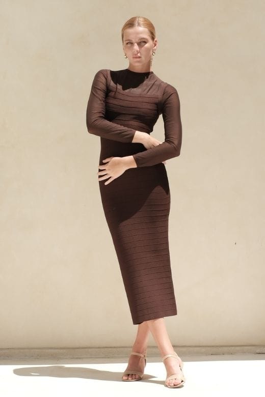 Woman wearing a figure flattering  Robin Long Sleeve Bandage Maxi Dress - Tan Brown BODYCON COLLECTION Pty Ltd