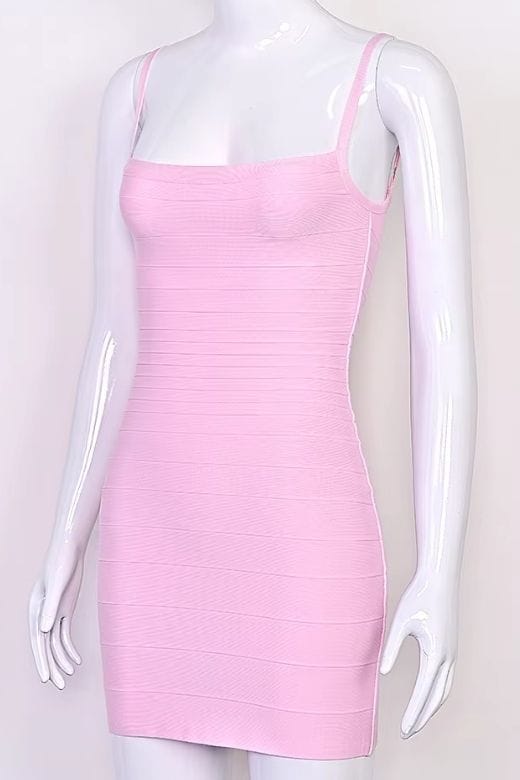 Woman wearing a figure flattering  Scarlett Bandage Mini Dress - Dusty Pink BODYCON COLLECTION Pty Ltd