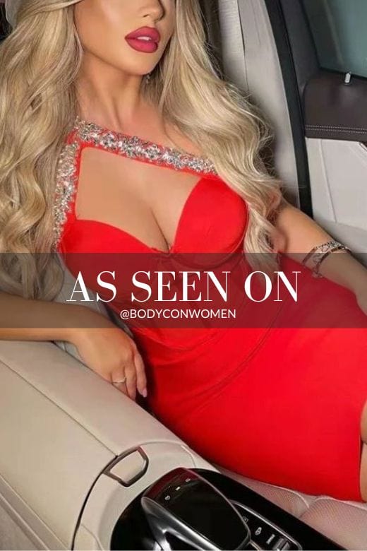 Woman wearing a figure flattering  Shanae Bandage Dress - Lipstick Red BODYCON COLLECTION