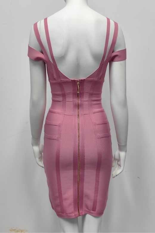 Woman wearing a figure flattering  Sia Bandage Dress - Ballet Pink Bodycon Collection