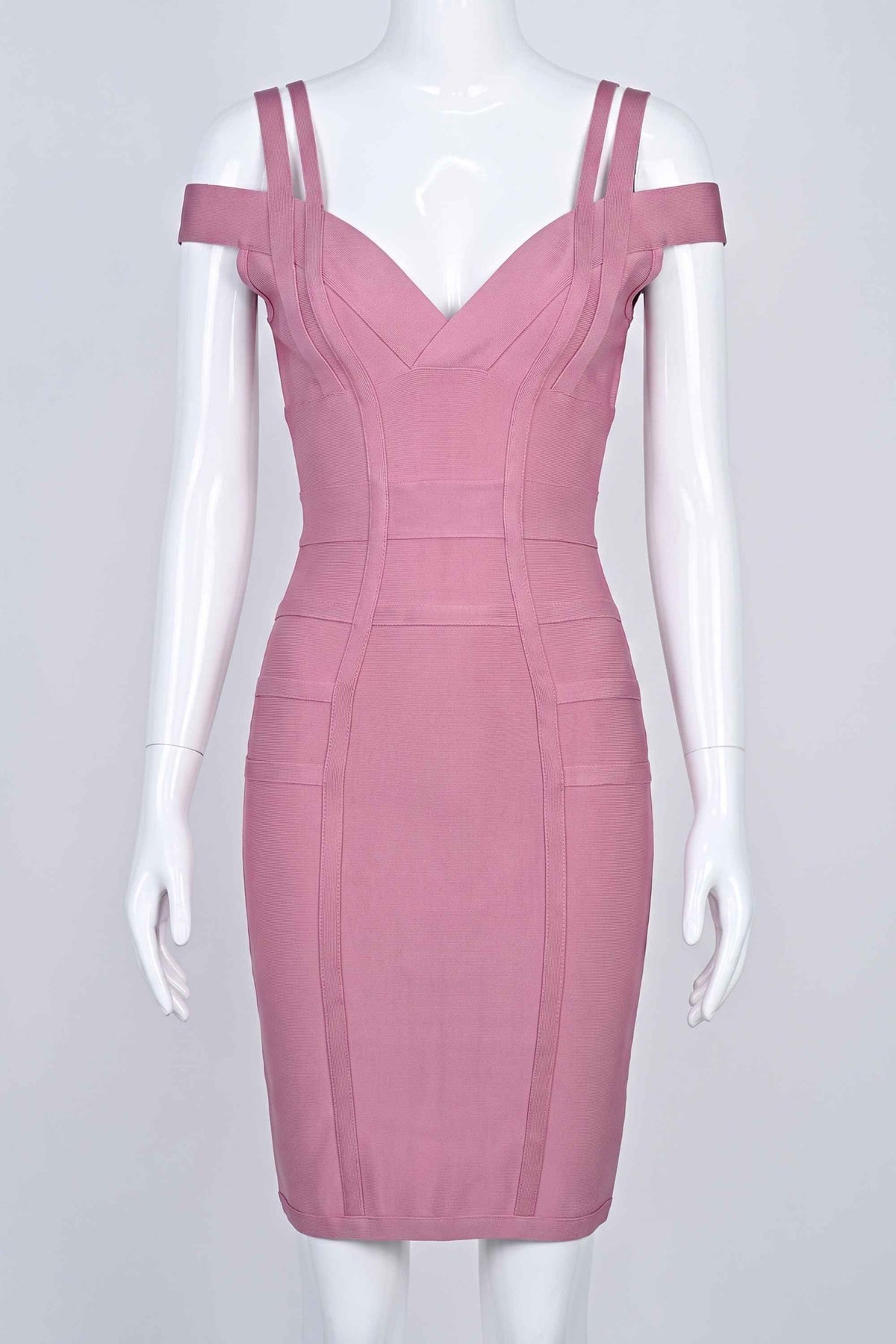 Woman wearing a figure flattering  Sia Bandage Dress - Ballet Pink Bodycon Collection