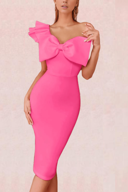 Woman wearing a figure flattering  Sisi Bow Bodycon Dress - Hot Pink BODYCON COLLECTION