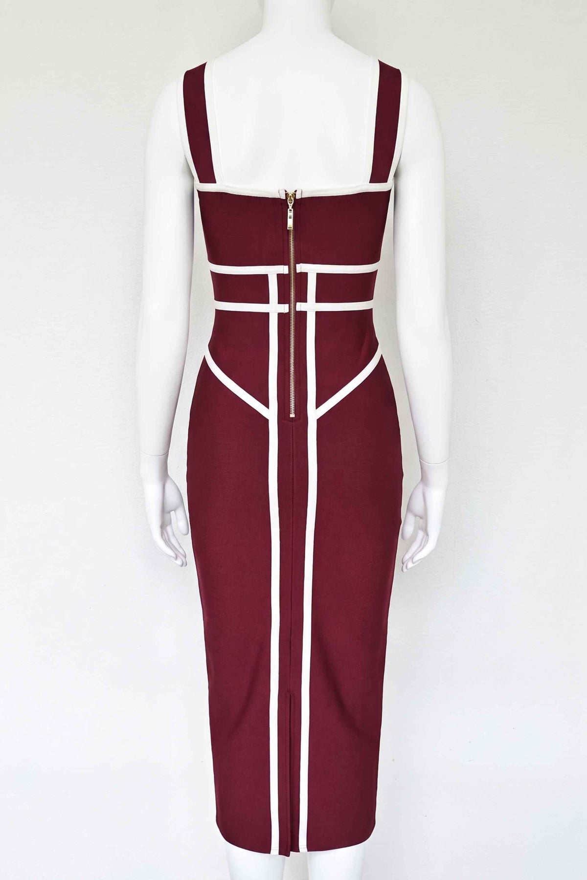 Woman wearing a figure flattering  Suki Bandage Midi Dress - Red Wine BODYCON COLLECTION