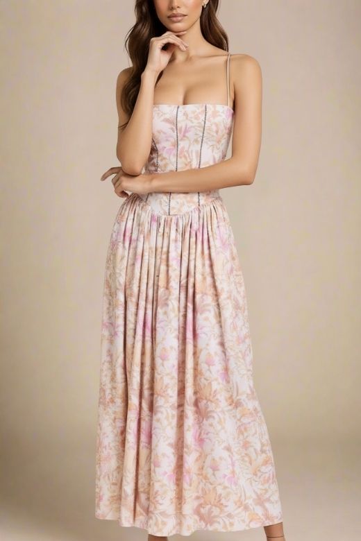 Woman wearing a figure flattering  Tasmin Midi Dress - Pink Print BODYCON COLLECTION