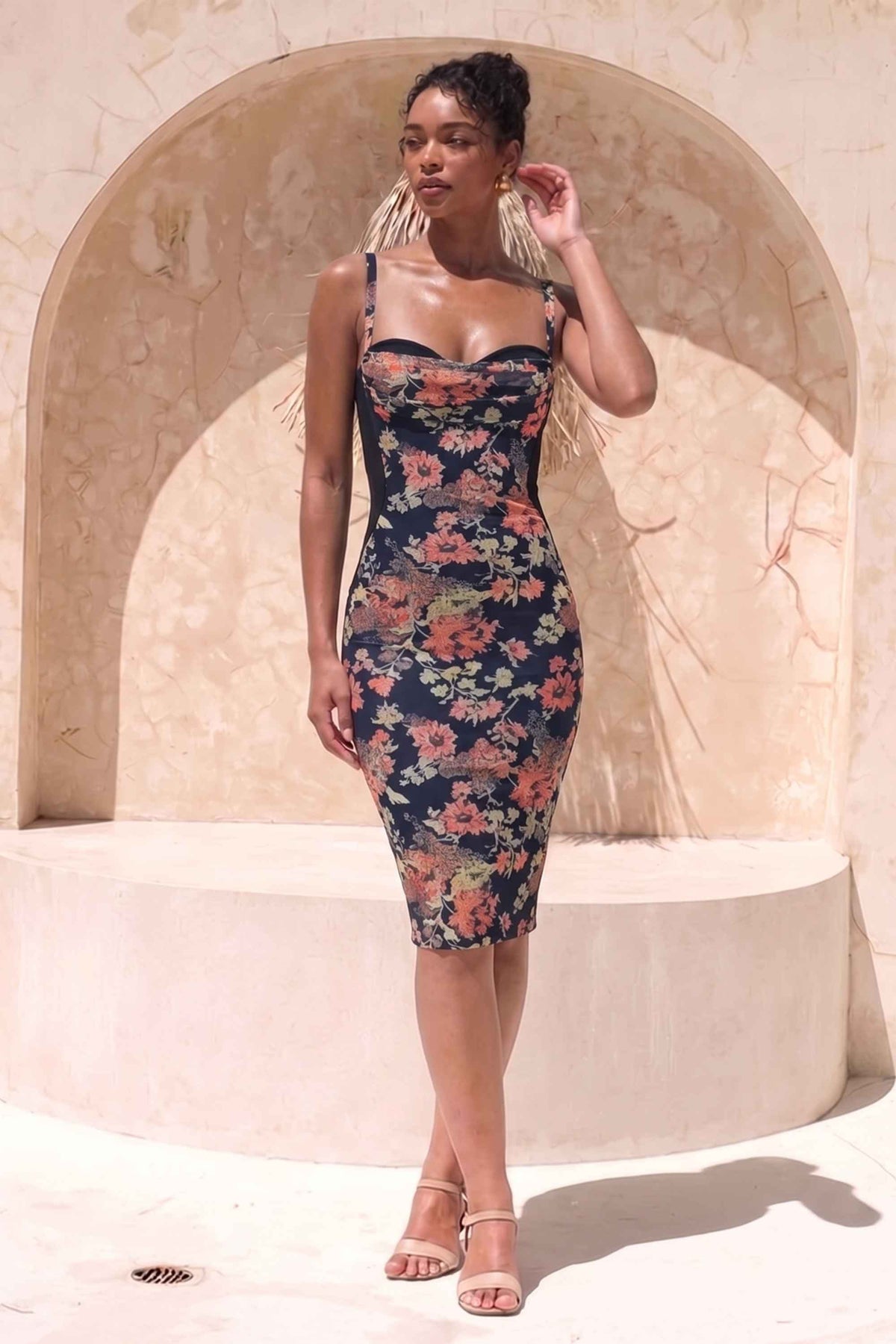 Woman wearing a figure flattering  Tate Bodycon Wrap Dress - Classic Black BODYCON COLLECTION Pty Ltd