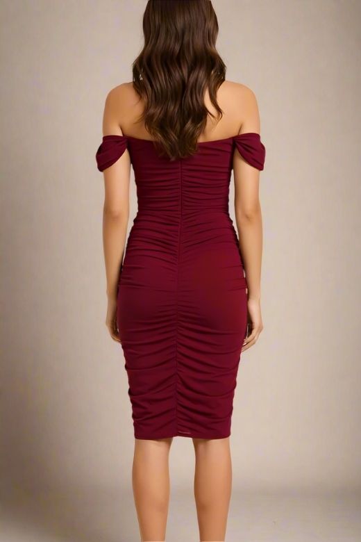Woman wearing a figure flattering  Zia Bodycon Wrap Dress - Red Wine Bodycon Collection